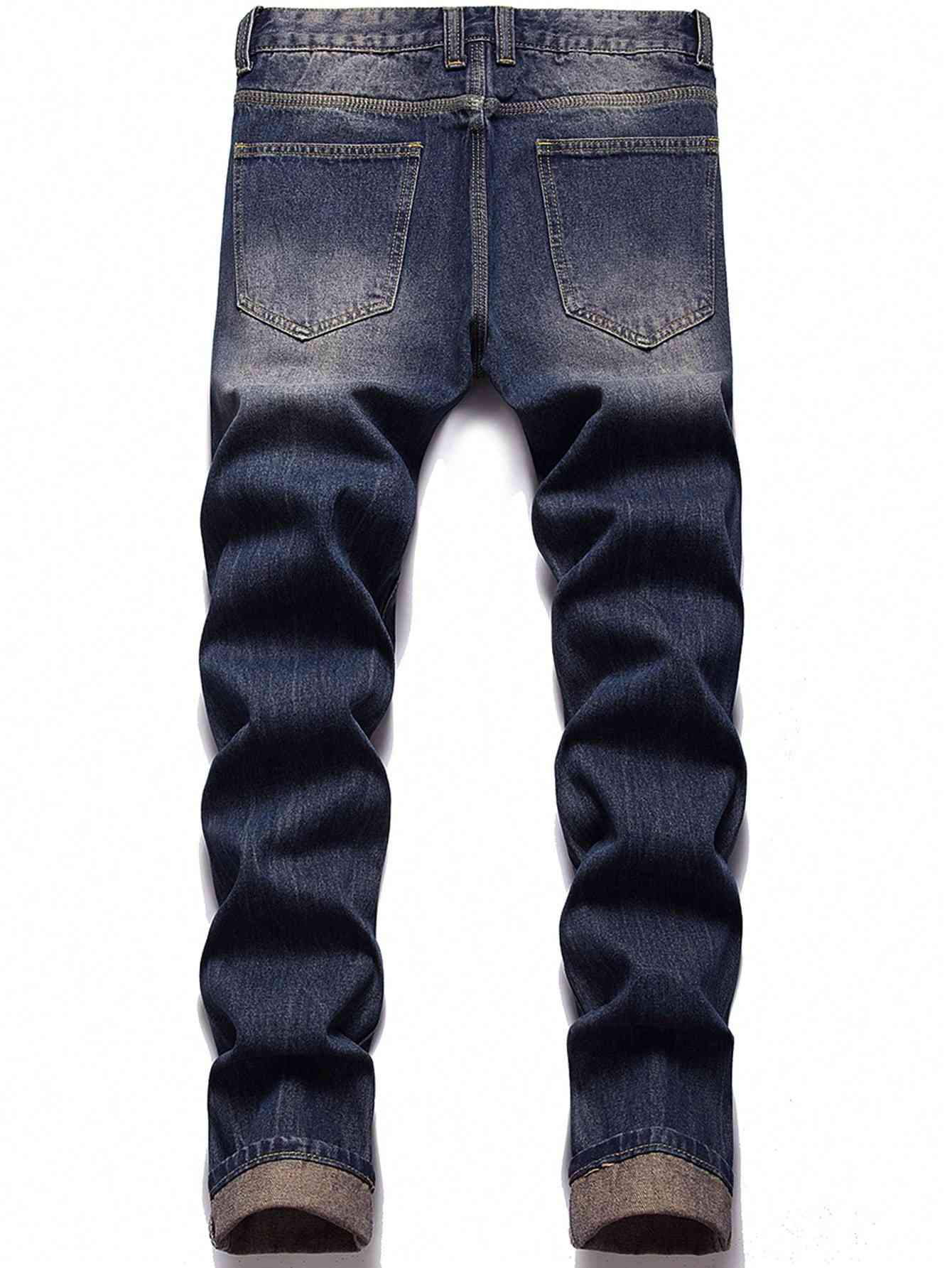 Tween boy's ripped jeans with a teddy bear design, crafted from high-quality denim for comfort and durability. Classic fit with a stylish faded wash.