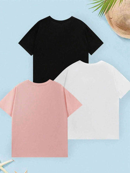 Back view of the Cartoon 3-piece set of young girls' t-shirts in black, white, and pink. Classic round-neck design with a relaxed fit.