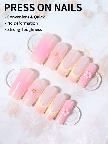 Floral French Tip Press-On Nails featuring a soft pink gradient with delicate 3D floral accents. Easy to apply, durable, and perfect for a salon-quality manicure at home.