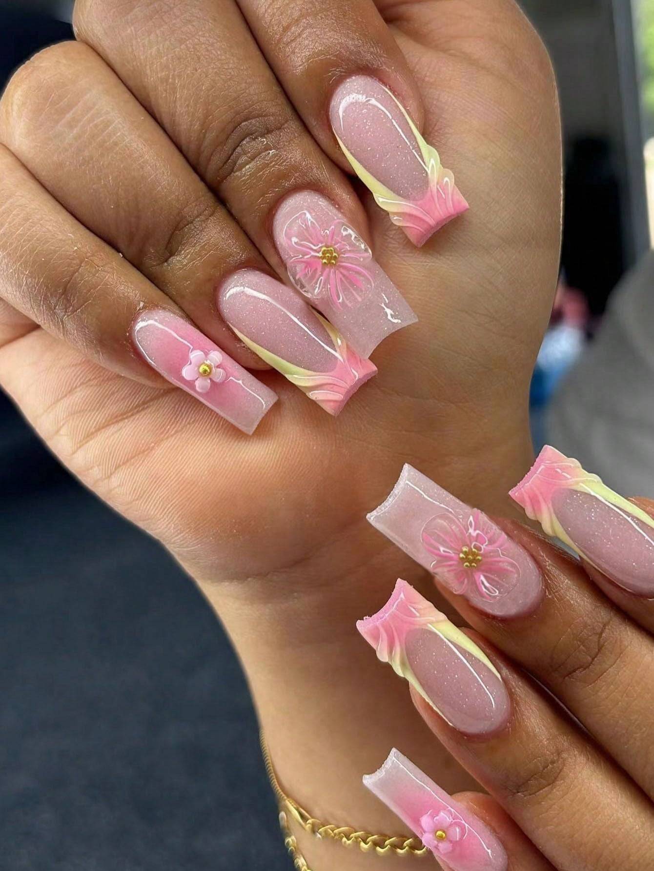 Floral French Tip Press-On Nails featuring elegant 3D pink flower designs with a glossy finish. Perfect for a salon-quality manicure at home.