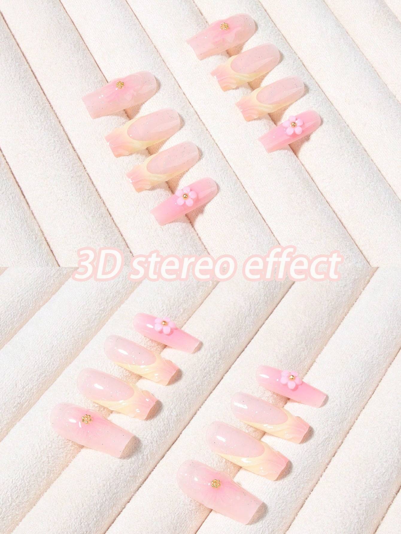 Floral French Tip Press-On Nails with 3D flower accents in soft pink hues. Elegant and easy-to-apply false nails for a salon-quality manicure.