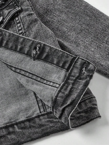 Cuff detail of kids' black denim jacket, showing high-quality stitching and distressed accents for a fashionable touch.