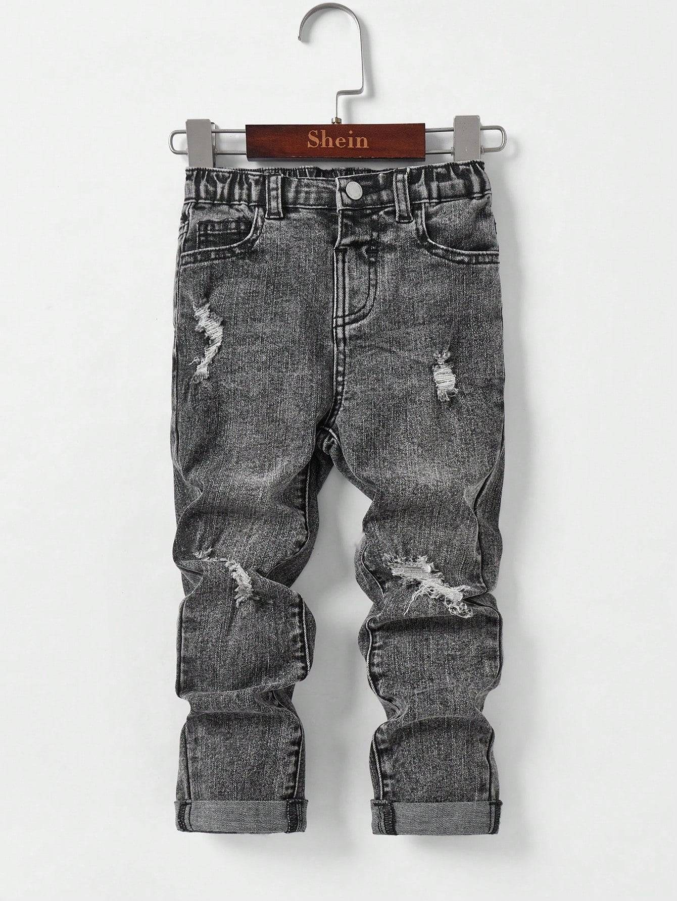 Kids' black denim jeans with distressed details and rolled-up cuffs, designed for comfort and durability in daily activities.