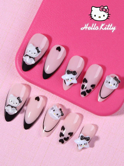 24-piece press-on nail set featuring almond-shaped false nails with Hello Kitty 3D bows, pearls, and heart accents in a chic pink and black design.