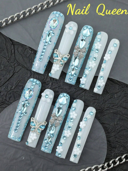 10-piece enchanting butterfly & flower press-on nails with shimmering blue rhinestones and 3D metallic butterfly accents for an elegant look.