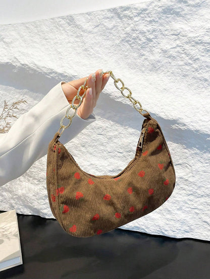 Bolso de mano con forma de media luna y flores